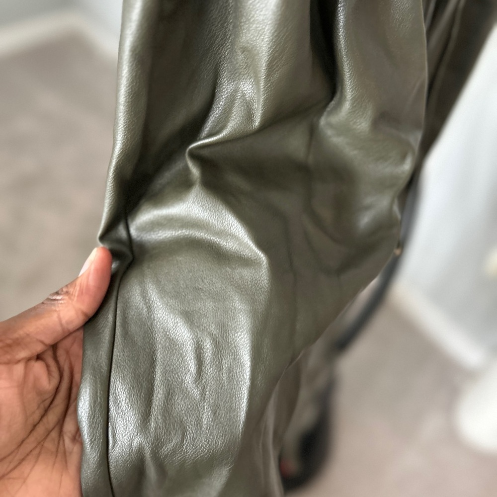 Army green faux leather capri pants. Hits at ankle